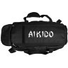 Сверху сумки вышито: "AIKIDO". Также для удобства сумка открывается двумя молниями.